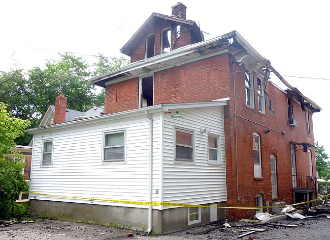 Faulty wiring is the suspected cause of Wednesday evening's fire at a Westminster College office building, Fire Chief Kevin Coffelt said. The building's roof caved in and the interior was damaged enough to prevent a fire marshal from entering yesterday.