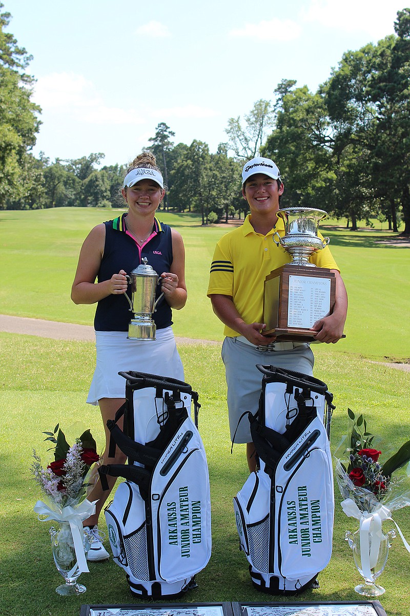 Casey Ott, left, of Conway and Ethan Eppinette of Texarkana pose with their division trophies at the ASGA Junior Championship.