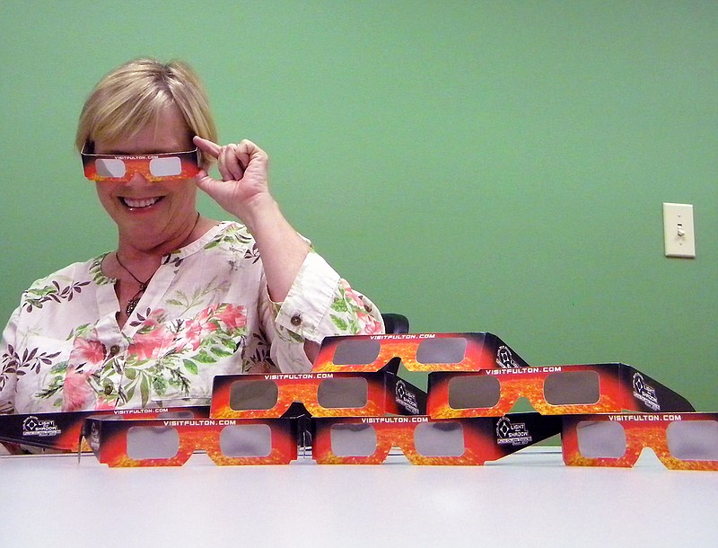 Callaway County director of tourism Renee Graham puts on eclipse viewing glasses. The Great American Eclipse will take place Aug. 21. Several events have been planned in Callaway County for the days leading up to the eclipse.