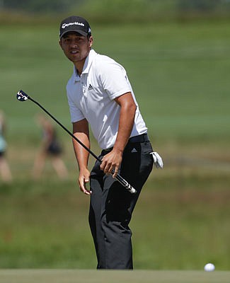 Xander Schauffele watches his putt on the ninth hole during Friday's second round of the U.S. Open at Erin Hills in Erin, Wis. 