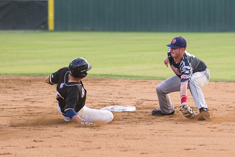 Texarkana Twins' Blake Porter slides into second as Acadiana Cane Cutter's Canes Castille fails to tag him out on Saturday at George Dobson Field in Texarkana.