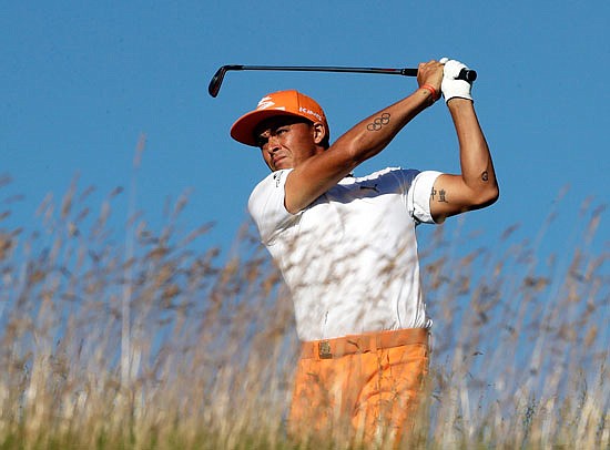 Rickie Fowler watches his shot during Sunday's final round in the U.S. Open at Erin Hills in Erin, Wis.
