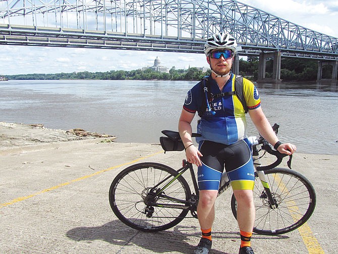 Josh Hickman road into Jefferson City from the Katy Trail on Sunday. He's a local resident participating in the Bike & Build cross-country ride for affordable housing. After around 1,000 miles on the road, the group of more than 30 riders stayed the night in Jefferson City before heading out this morning.