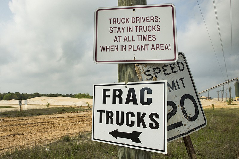A sign pointing the way to a loading site at the Superior Silica Sands sand mine is shown on March 28 in Kosse, Texas. Demand for sand is surging as oil and gas production in the Permian Basin is booming again. Not only is the need for more sand on the rise with the increase in oil and gas production in west Texas, but much more sand is being pumped into each well now with the emerging thesis that more sand equals more oil extracted. 