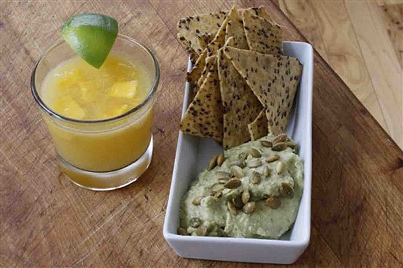 This March 28, 2016 photo shows refried edamame. For a lighter version of Mexican-styled refried beans, replace the pinto beans with edamame. (AP Photo/J.M.Hirsch)