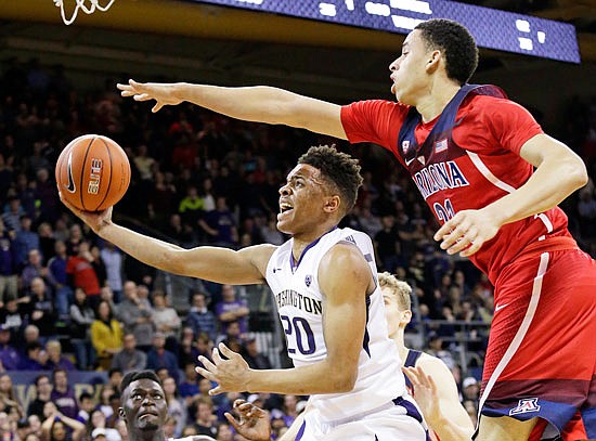Markelle Fultz of Washington drives past Arizona's Chance Comanche during a game last season in Seattle. Fultz is the likely No. 1 pick in the NBA draft Thursday night.