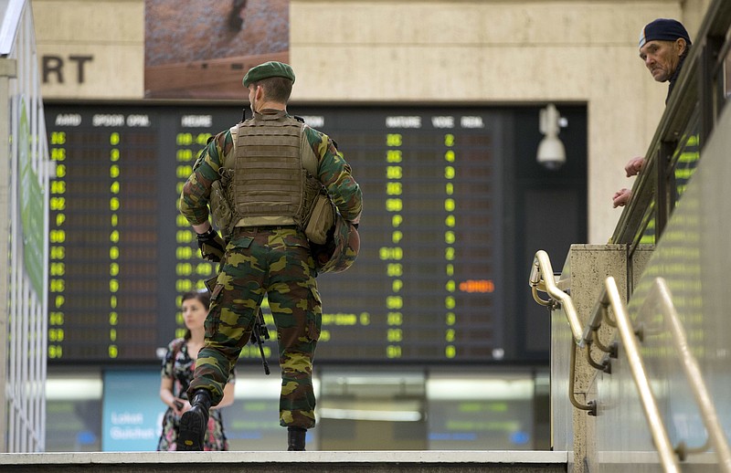 A Belgian Army soldier patrols inside Central Station in Brussels on Wednesday, June 21, 2017. Belgian authorities said they foiled a "terror attack" when soldiers shot a suspect in the heart of Brussels after a small explosion at a busy train station Tuesday on a night that continued a week of attacks in the capitals of Europe. (AP Photo/Virginia Mayo)