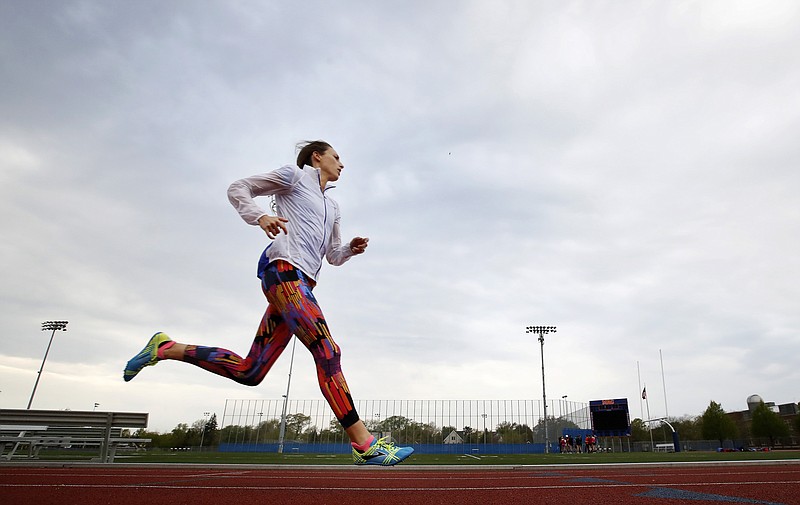 In this May 8, 2017, file photo, Gabriele Grunewald trains at Macalester College in St. Paul, Minn. Grunewald is two weeks into chemotherapy to treat cancer that's gone from her salivary gland to her liver. That won't keep her from taking the starting line for the 1,500 meters Thursday, June 22, at the U.S. track and field championships. 