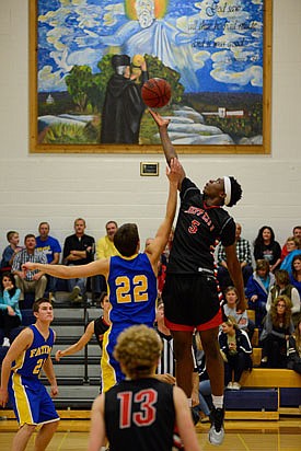 OG Anunoby wins the tip during at the start of a Jamboree contest between Jefferson City and Fatima on Nov. 21, 2014, at Helias. After two years at Indiana, Anunoby is expected to be a first-round selection in the NBA draft tonight.