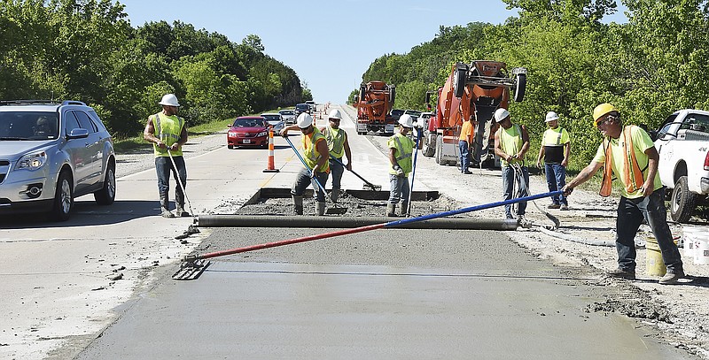 Employees of Boone Construction Co. work on the MoDOT Route B project on June 19, 2017, starting at the intersection of Lorenzo Greene Drive in Cole County and concluding at Route 133 in Meta.