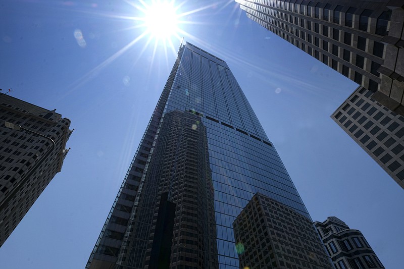 Downtown buildings are reflected in the newly build Wilshire Grand Center in Los Angeles on Thursday, June 22, 2017. The 73-story, 1,100-foot-high (335.3 meters) Wilshire Grand Center, the tallest building west of the Mississippi, opens Friday, celebrating with lights and fanfare in a once-stodgy downtown that has erupted in new skyscrapers. (AP Photo/Richard Vogel)