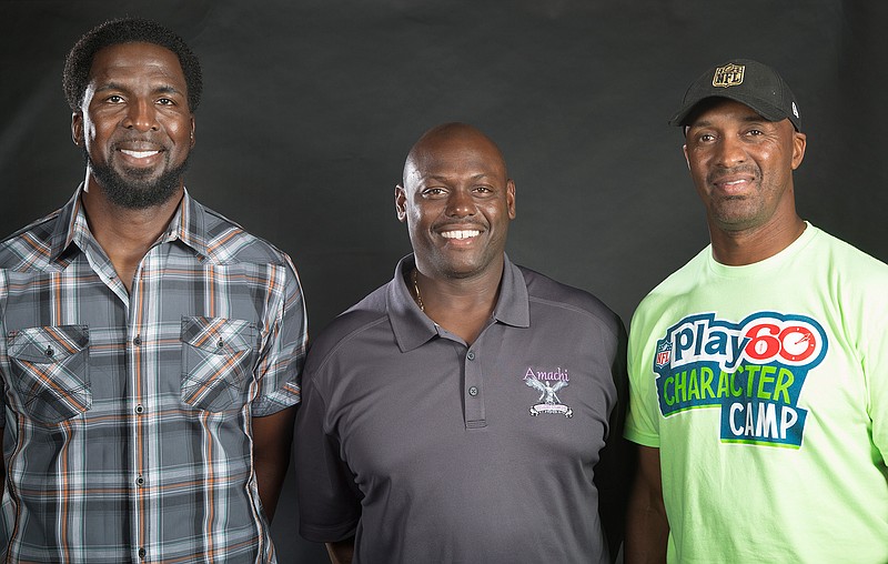 From left, Rose Collins of the Miami Dolphins and the Dallas Cowboys, Preston Taylor of the Buffalo Bills and Byron Williams of the New York Giants pose for a photo.