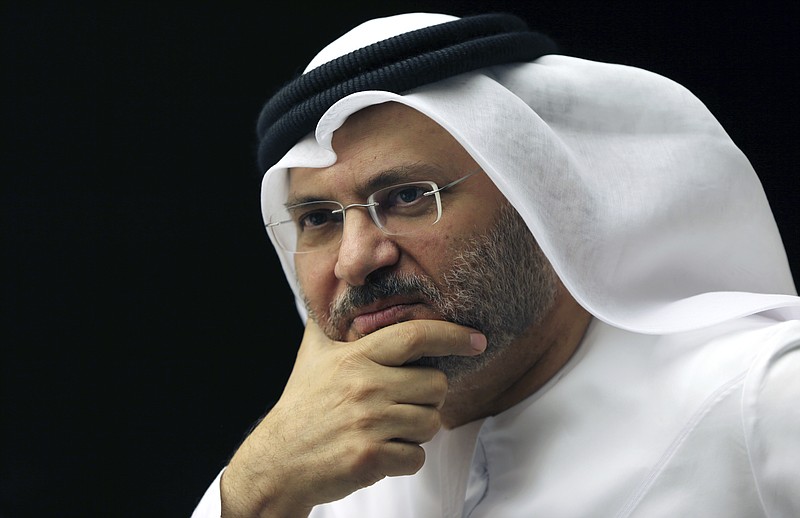 Anwar Gargash, UAE Minister of State for Foreign Affairs talks to the media during a press conference in Dubai, United Arab Emirates, Saturday, June 24, 2017. The top United Arab Emirates official says the Arab countries isolating Qatar do not seek to force out the country's leadership but are willing to cut ties with it if it does not agree to their demands. (AP Photo/Kamran Jebreili)