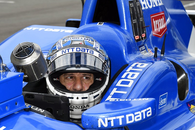 In this June 9, 2017, file photo, Tony Kanaan, of Brazil, sits in his car on pit road during an IndyCar auto race practice session at Texas Motor Speedway in Fort Worth, Texas. Kanaan feels like a veteran again this weekend at Road America. 