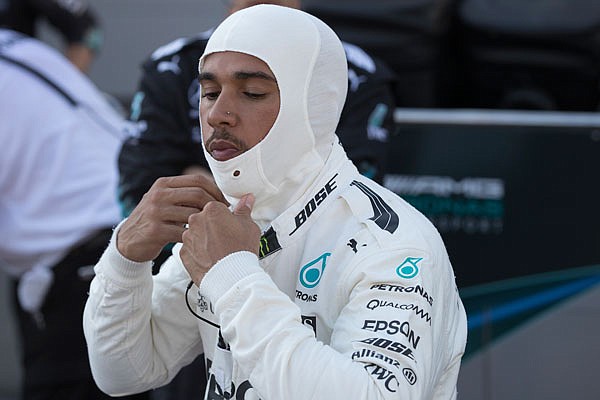 Mercedes driver Lewis Hamilton waits Sunday during a temporary halt at the Formula One Azerbaijan Grand Prix in Baku, Azerbaijan.