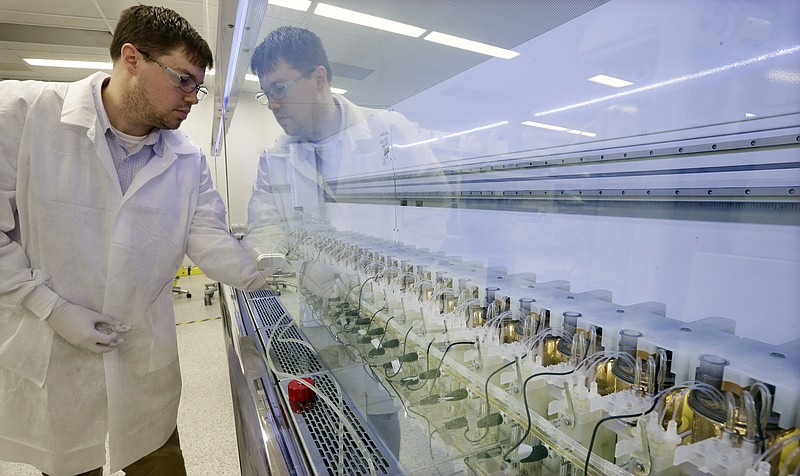 <p>AP</p><p>Scientist Christopher Kistler checks on experiments in AMBR250 bio-reactors in a laboratory at the Merck company facilities in Kenilworth, New Jersey. The bio-reactors allow a large number of experiments to be done in the lab at the same time. Merck said a new type of cholesterol drug, in testing for many years, reduced heart attacks, deaths and other complications of heart disease in a huge late-stage study.</p>