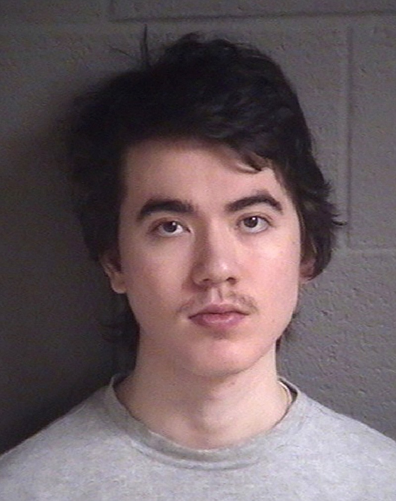 This undated booking photo provided by Buncombe County Detention Facility, shows North Carolina resident Justin Nojan Sullivan, who was sentenced to life in prison on Tuesday, June 27, 2017, for a foiled terror plot inspired by the Islamic State group. He pleaded guilty in late 2016 to one count of attempting to commit an act of terrorism. He was arrested in 2015 after authorities say he plotted to kill hundreds at a nightclub or concert. (Buncombe County Detention Facility via AP)