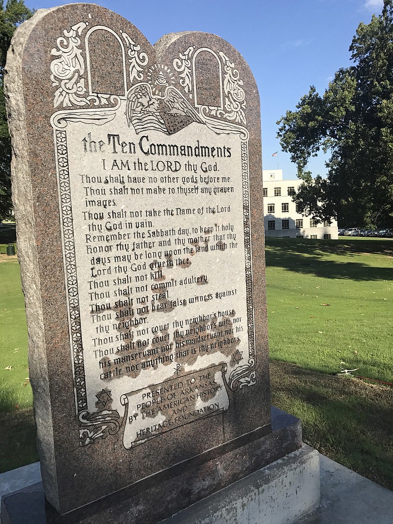 <p>AP</p><p>A 6-foot-tall privately funded Ten Commandments monument is seen on the Arkansas Capitol grounds in Little Rock on Tuesday after it was installed by workers two years after lawmakers approved a measure allowing the statue on state property.</p>