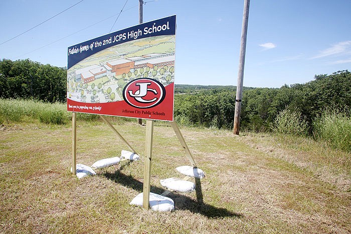 A sign marking the future site of the second Jefferson City High School sits off Missouri 179.