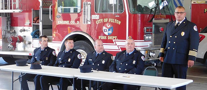 From left are new Fulton firefighter Joey Mirth, newly promoted fire engineers Justin Malone, Scott Peterson and Randy Bell, and new Fire Chief Kevin Coffelt. 