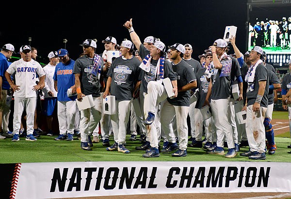 Florida players celebrate after defeating LSU in Game 2 to win the College World Series on Tuesday in Omaha, Neb.