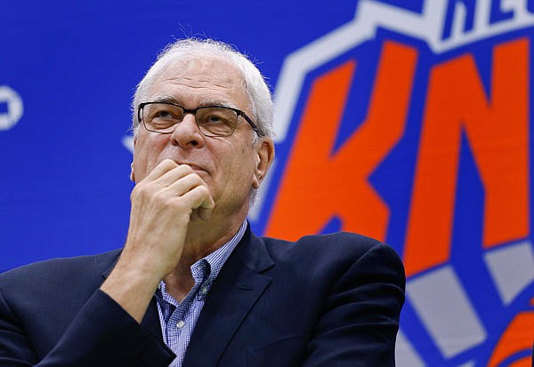 In this July 8, 2016, file photo, Knicks president Phil Jackson answers questions during a news conference at the team's training facility in Greenburgh, N.Y. The Knicks and Jackson parted ways Wednesday morning, ending a three-year tenure that saw plenty of tumult and not a single playoff appearance.