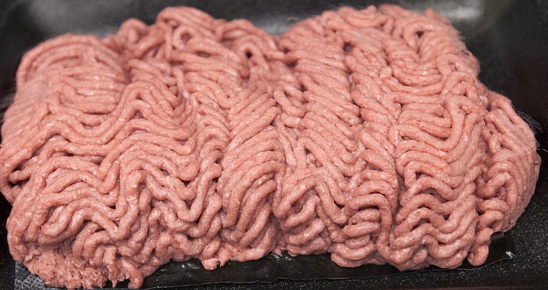 This March 29, 2012, file photo, shows the beef product that critics call "pink slime" during a plant tour of Beef Products Inc. in South Sioux City, Neb. Beef Products Inc. says the settlement reached with ABC in a $1.9 billion defamation lawsuit over the network's reports on its lean, finely textured beef product provides a strong foundation on which to grow the business. The terms of the settlement announced Wednesday, June 28, 2017 are confidential. 