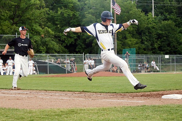 Renegades right fielder Cole Evans stretches toward first base during Wednesday night's game against the St. Louis Pirates in non-MINK League play at Vivion Field.