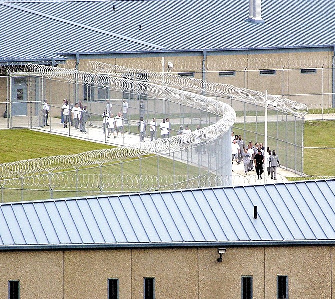 In this Sept. 15, 2004, file photo, prisoners arrive at Jefferson City Correctional Center.