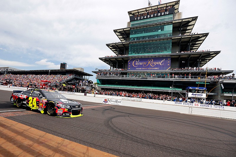 In this July 27, 2014, file photo, Jeff Gordon crosses the finish line to win the NASCAR Brickyard 400 auto race at Indianapolis Motor Speedway in Indianapolis. Five-time Brickyard 400 winner Jeff Gordon will lead the field into the race one more time next month — as the pace-car driver. 