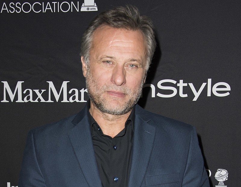  In this Sept. 12, 2015 file photo, Swedish actor Michael Nyqvist attends The Hollywood Foreign Press Association (HFPA) and InStyle's annual Toronto International Film Festival celebration in Toronto. Nyqvist, who starred in the original "The Girl With the Dragon Tattoo" films and often played villains in Hollywood movies like "John Wick" died after a year-long battle with lung cancer. He was 56. 