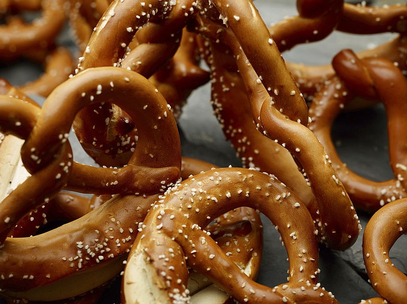 This June 26 2017 photo provided by The Culinary Institute of America shows soft pretzels in Hyde Park, N.Y. This dish is from a recipe by the CIA. (Phil Mansfield/The Culinary Institute of America via AP)