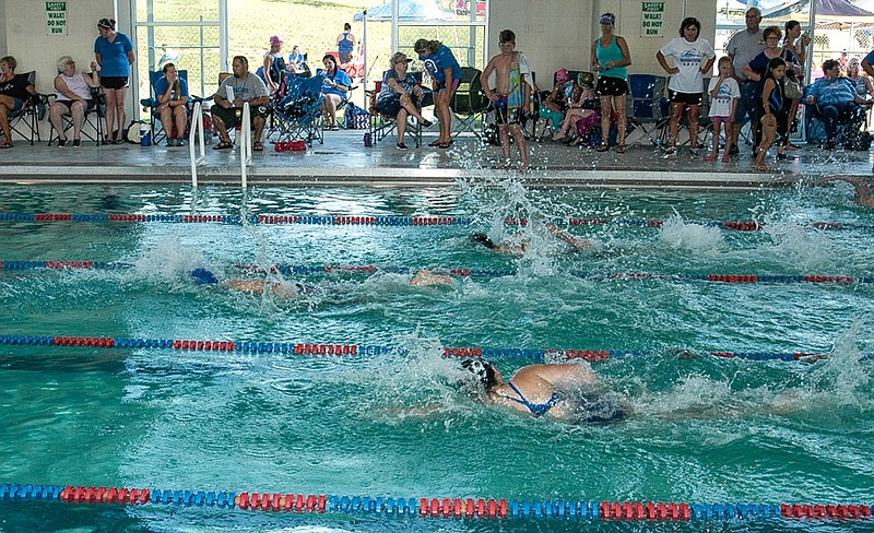 Swimmers race in mixed relays during the competition with three other teams June 28, 2017 at the California municipal pool.