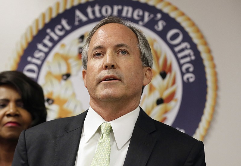 In this June 22, 2017 file photo, Texas Attorney General Ken Paxton speaks at a news conference in Dallas. Paxton has raised more than $500,000 to pay for private attorneys who are defending him on criminal securities fraud charges. Financial statements released Wednesday, July 5, 2017, show that the Republican last year received donations for his legal bills not just from Texas but from individuals and groups in Arizona, Arkansas and Virginia. 