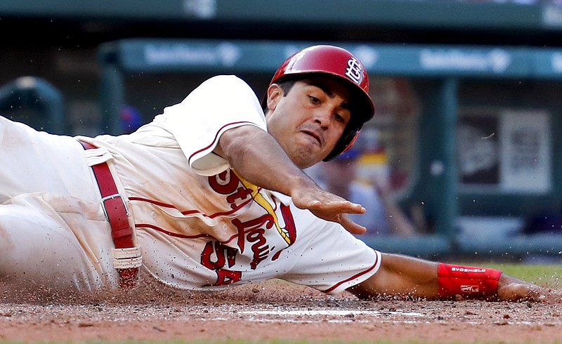 St. Louis Cardinals' Alex Mejia scores during the eighth inning of a baseball game against the New York Mets, Saturday, July 8, 2017, in St. Louis.