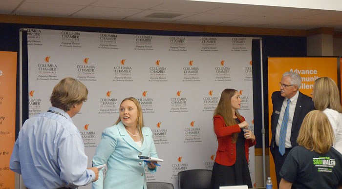 Republican Sara Walsh, in the light blue on the left, and Democrat Michela Skelton, in the red at right, spoke Wednesday, July 12, 2017 at a forum for the 50th House District candidates in Columbia.