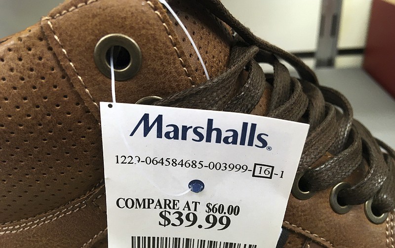 This Tuesday, May 16, 2017, photo shows a price tag on a pair of shoes for sale at a Marshalls store, in Methuen, Mass. On Friday, July 14, 2017, the Commerce Department releases U.S. retail sales data for June. (AP Photo/Elise Amendola)