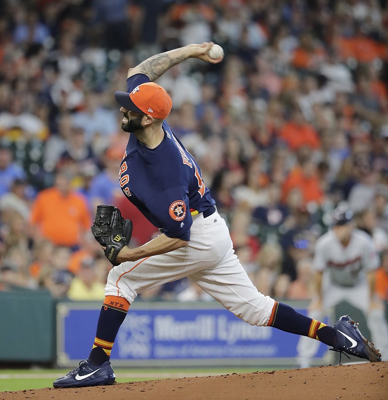 Houston Astros starting pitcher Mike Fiers throws against the Minnesota Twins during the first inning of a baseball game Sunday, July 16, 2017, in Houston. 