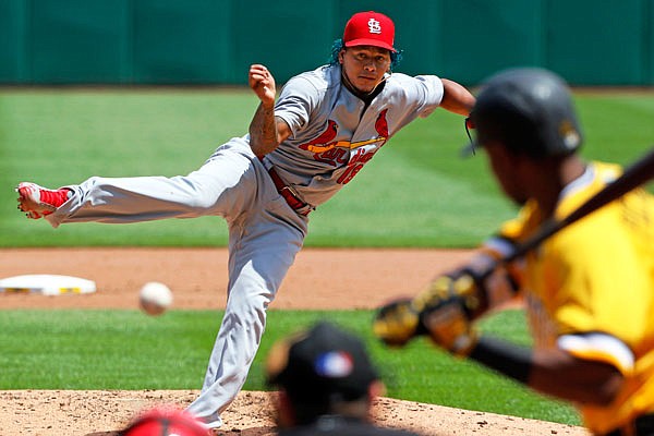 Cardinals starting pitcher Carlos Martinez delivers to the plate in the fourth inning of Sunday afternoon's game against the Pirates in Pittsburgh.