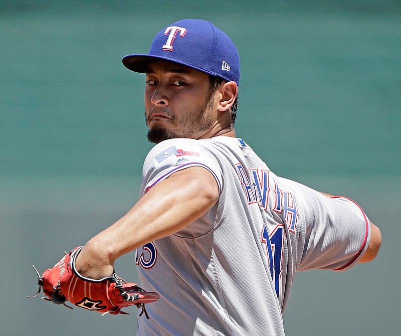 Texas Rangers starting pitcher Yu Darvish throws during the second inning of a baseball game against the Kansas City Royals, Sunday, July 16, 2017, in Kansas City, Mo. 