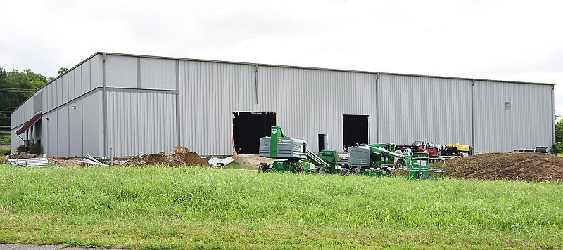 In this July 16, 2017 photo, new work is shown at a Jefferson City Area Chamber of Commerce building at the intersection of Algoa and Shamrock roads. The spec building, sold to an Ohio-based holding company, was revealed on Aug. 4 to be the site of an Axium Plastics LLC manufacturing facility. The company designs, manufactures and supplies plastic bottles. 