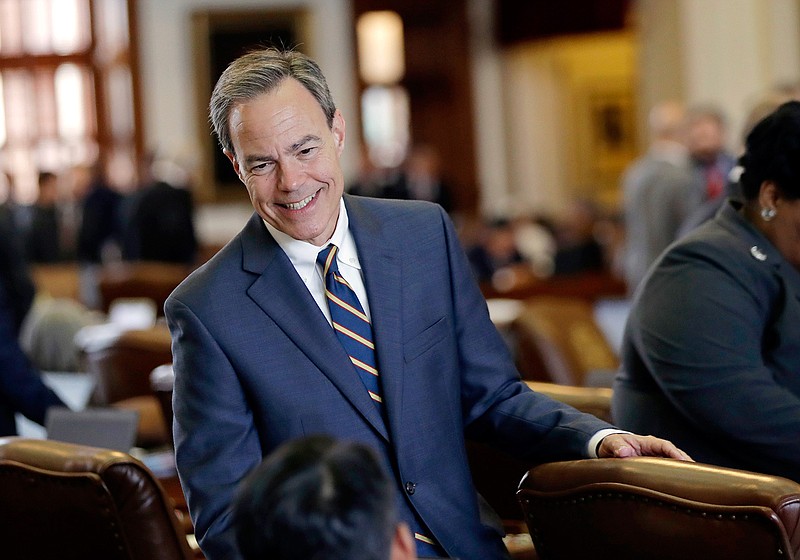 In this April 19, 2017, file photo, Texas Speaker of the House Joe Straus, R-San Antonio, talks with fellow lawmakers on the House floor at the Texas Capitol in Austin. Straus has for months opposed a "bathroom bill" targeting transgender people, saying the proposal could spark boycotts that could hurt the state's economy. The Legislature is heading into special session on Tuesday, July 25 and conservative groups have promised to target Straus and his key House lieutenants during March's GOP primaries if the issue doesn't pass. 