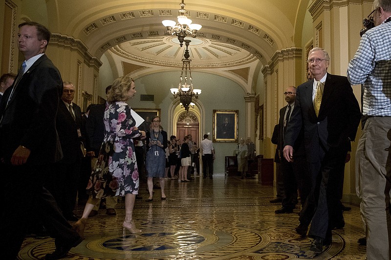<p>AP</p><p>Senate Majority Leader Mitch McConnell, of Kentucky, right, arrives for a Tuesday news conference on Capitol Hill. President Donald Trump blasted congressional Democrats and “a few Republicans” over the collapse of the GOP effort to rewrite the Obama health care law. McConnell proposed a vote on a backup plan simply repealing the statute, but that idea was on the brink of rejection, too.</p>