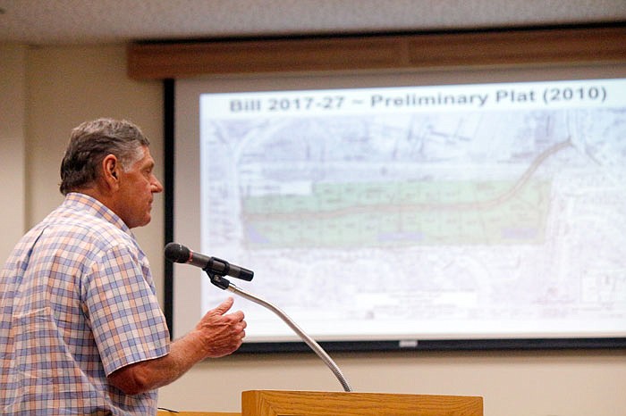 Mike Bates outlines some of the specifics he noticed when looking at the proposed plans for the new PUD plan for new apartments at Westview Height. Residents had the chance to also voice their opinions of the plan Monday at City Hall.