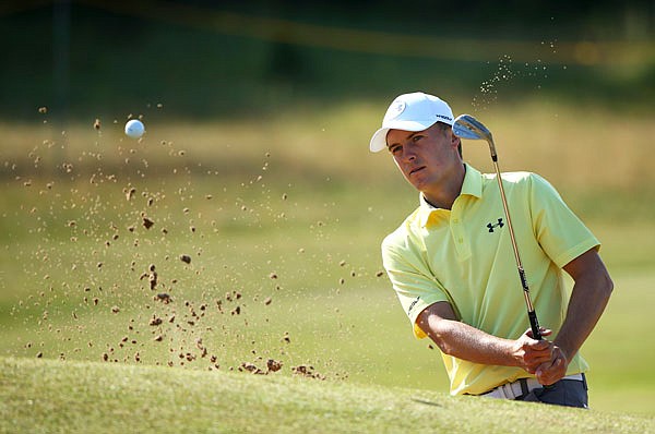 Jordan Spieth hits a shot out of a bunker on the fourth green during a practice round Tuesday for the British Open at Royal Birkdale in Southport, England. 