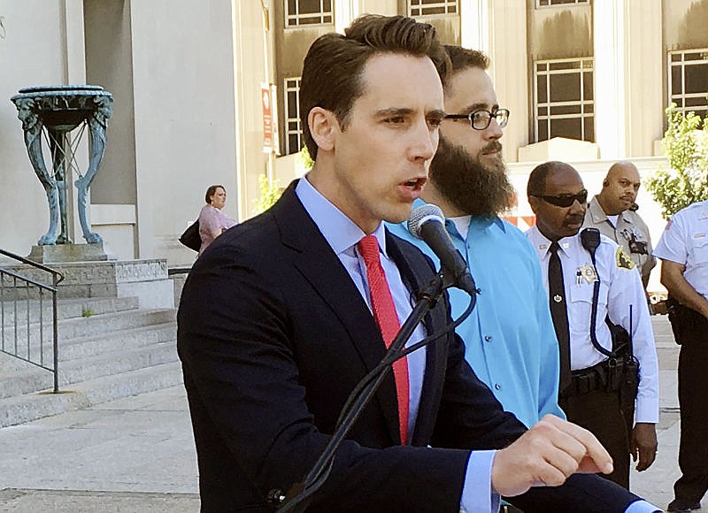 In this June 21, 2017 photo, Missouri Attorney General Josh Hawley speaks at a news conference in St. Louis. Missouri Republicans are coalescing around Hawley as their favored candidate to challenge veteran Democratic U.S. Sen. Clair McCaskill in 2018, which would set up a marquee contest between a wily incumbent and a fresh-faced political newcomer in a state that has trended conservative.