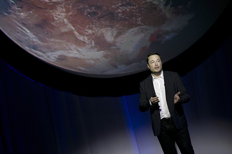 FILE - In this Sept. 27, 2016 file photo, SpaceX founder Elon Musk speaks during the 67th International Astronautical Congress in Guadalajara, Mexico. On Wednesday, July 19, 2017, Musk said the first launch of its big new rocket, the Falcon Heavy, is risky and stands “a real good chance” of failure. (AP Photo/Refugio Ruiz, File)