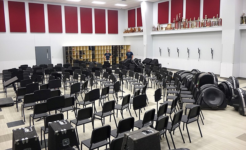 Plenty of space and pleasant accommodations for all 174 student musicians will welcome band members this fall. Band leaders David Thompson and Keith Sanders are standing at back.
