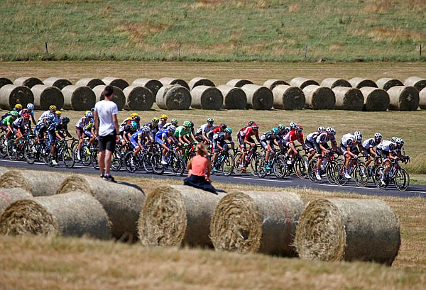 The pack rides during Tuesday's 102.5-mile 16th stage of the Tour de France with start in Le Puy-en-Velay and finish in Romans-sur-Isere, France.