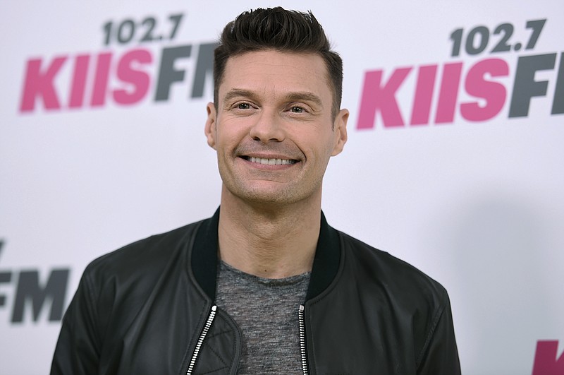 FILE - In a Saturday, May 13, 2017 file photo, Ryan Seacrest arrives at Wango Tango at StubHub Center, in Carson, Calif. Seacrest will be back hosting “American Idol” when it returns for a first season on ABC. Kelly Ripa made the announcement Thursday, July 20, 2017, on “Live with Kelly and Ryan,” which she has co-hosted with Seacrest since he joined her in May. (Photo by Richard Shotwell/Invision/AP, File)